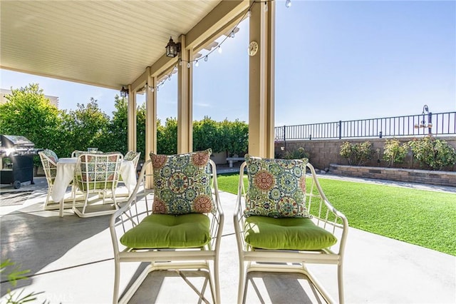 view of patio featuring a porch