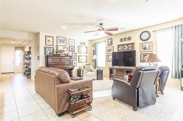 living room featuring light tile patterned floors and a wealth of natural light