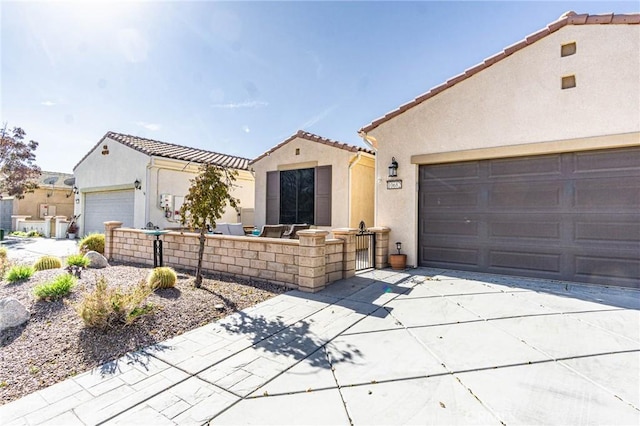 mediterranean / spanish-style house featuring a garage