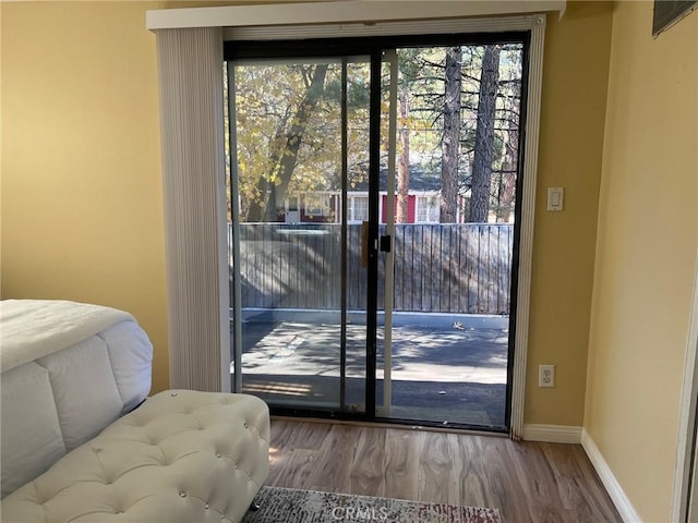 doorway to outside featuring hardwood / wood-style floors