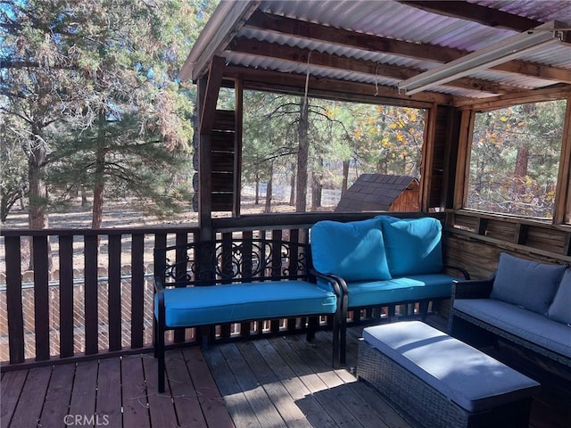 wooden deck featuring an outdoor living space