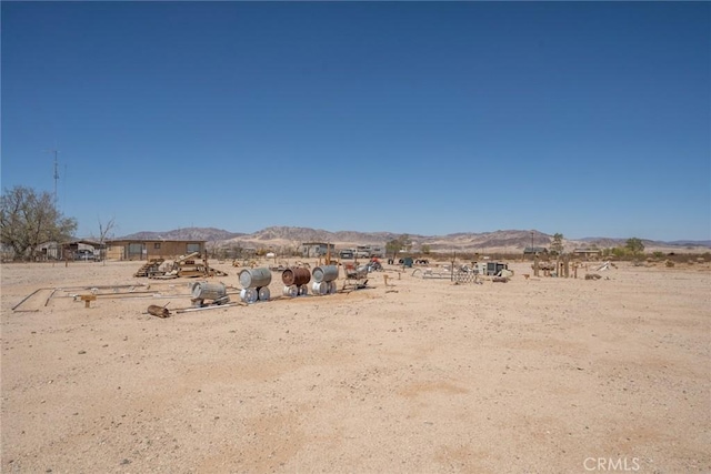 property view of mountains featuring a rural view