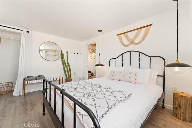 bedroom featuring light hardwood / wood-style flooring