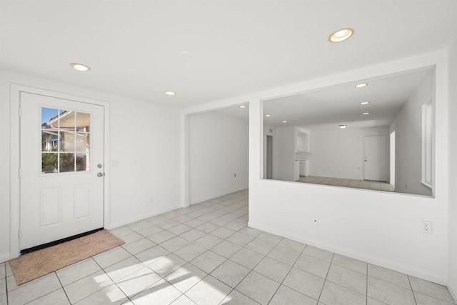 entryway featuring light tile patterned floors