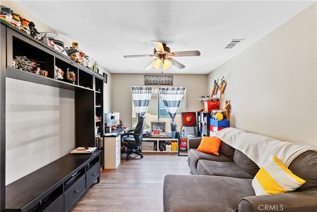 interior space with light hardwood / wood-style flooring and ceiling fan