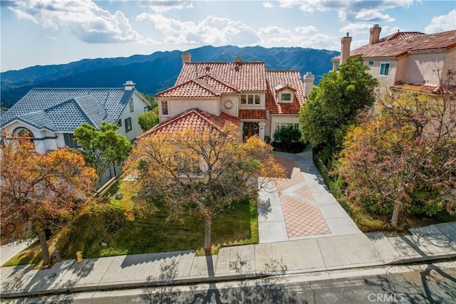 exterior space featuring a mountain view