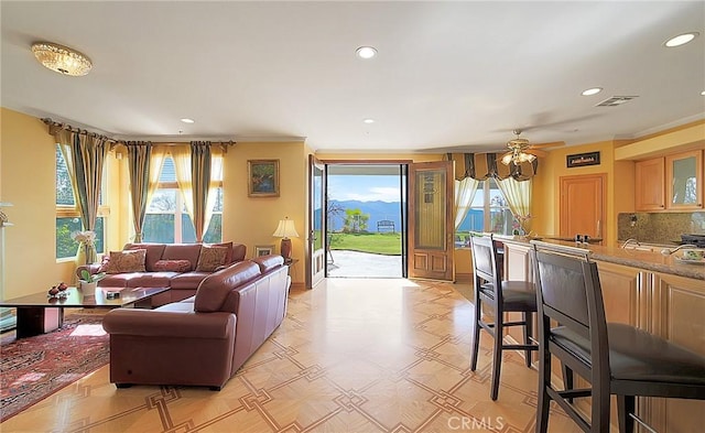 living room with ceiling fan