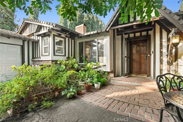 property entrance featuring a garage