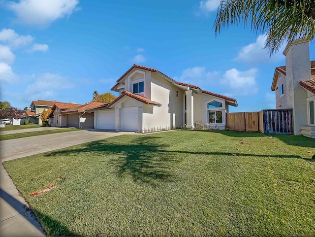 mediterranean / spanish-style home with a front lawn