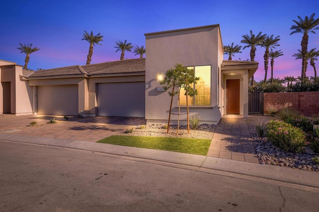 view of front of property featuring a garage