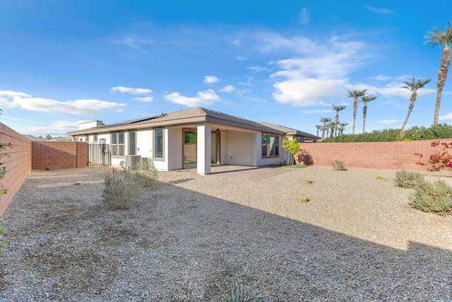 back of house featuring a patio and central AC