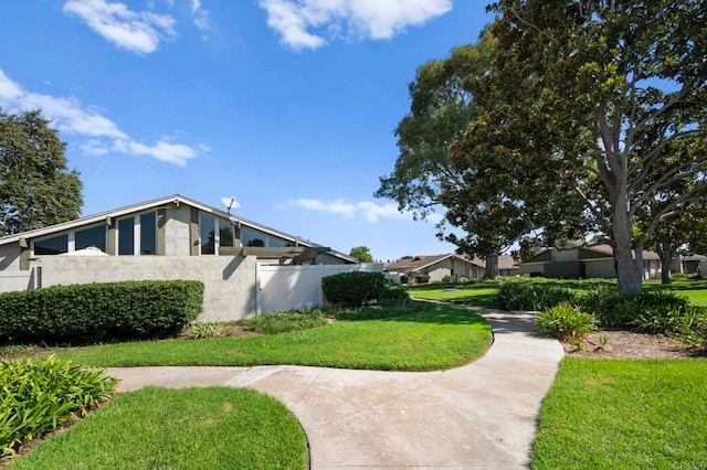 view of home's exterior featuring a lawn