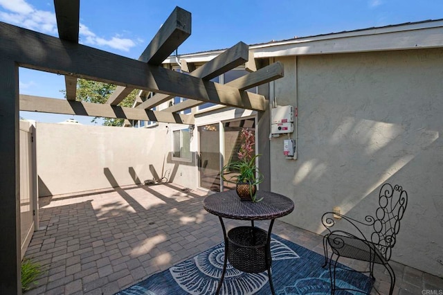 view of patio featuring a pergola