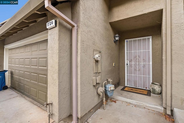 property entrance featuring a garage