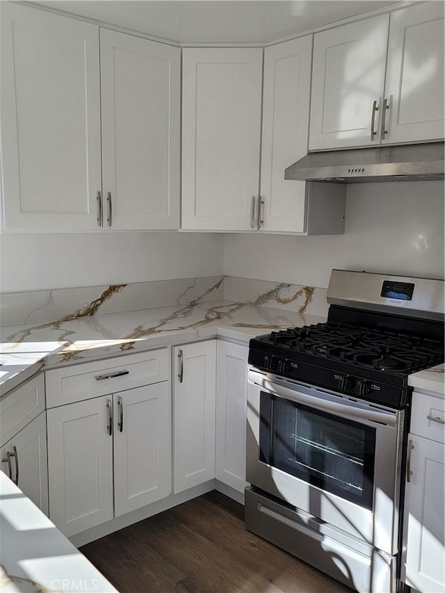 kitchen featuring white cabinets, dark hardwood / wood-style floors, and stainless steel range with gas stovetop