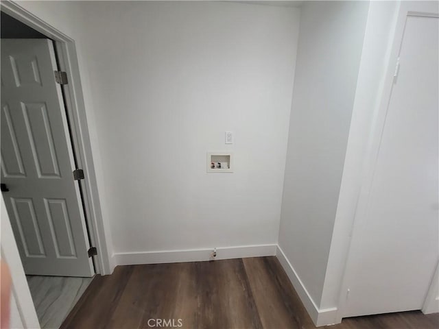 laundry area with dark hardwood / wood-style flooring and washer hookup