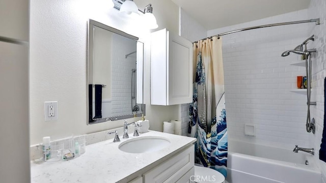 full bathroom featuring shower / bath combination with curtain, vanity, and toilet