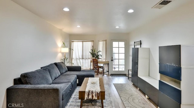 living room with hardwood / wood-style flooring