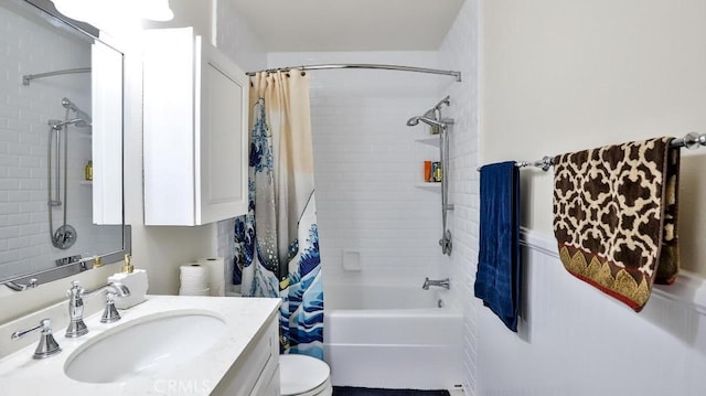 full bathroom featuring vanity, toilet, and shower / tub combo