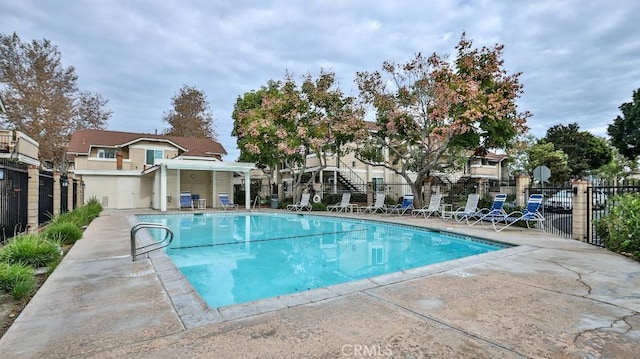 view of swimming pool featuring a patio