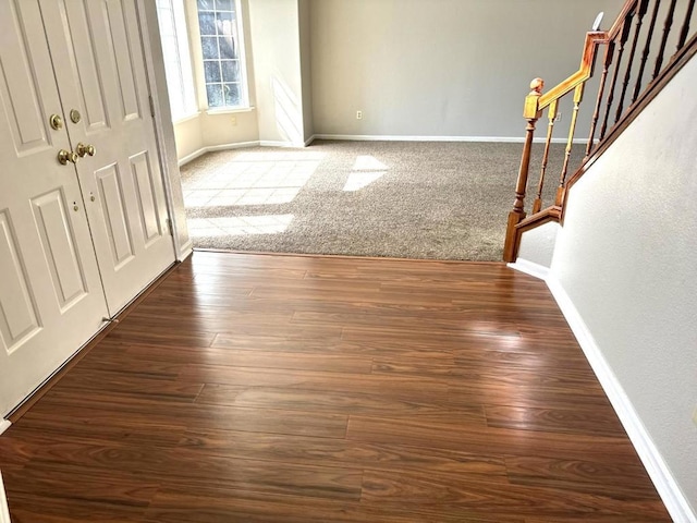 view of carpeted entrance foyer