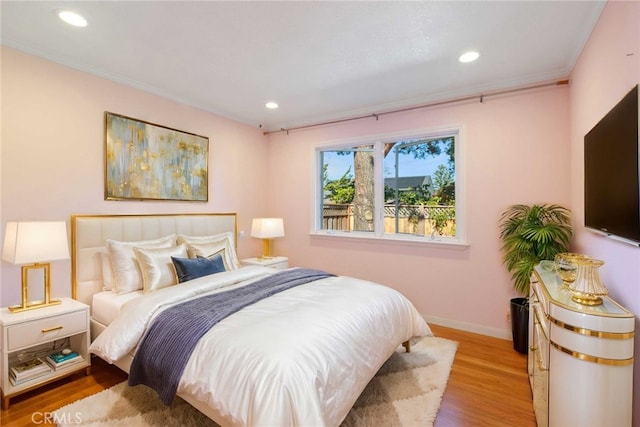 bedroom featuring light wood-type flooring