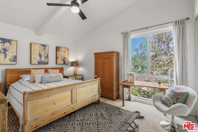 bedroom featuring lofted ceiling with beams, ceiling fan, and light colored carpet