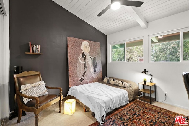 bedroom with carpet flooring, lofted ceiling with beams, ceiling fan, and wooden ceiling