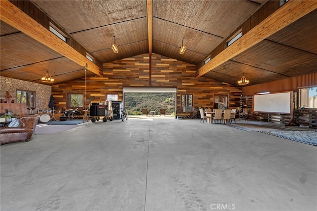 garage featuring wooden walls and wood ceiling