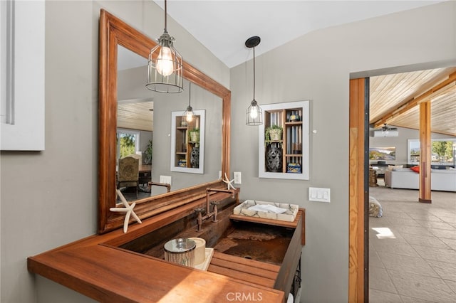 interior space featuring vaulted ceiling