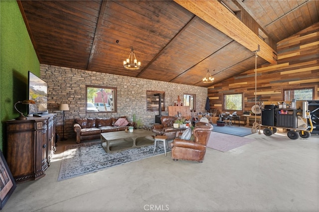 living room with wood walls, wooden ceiling, high vaulted ceiling, an inviting chandelier, and beam ceiling