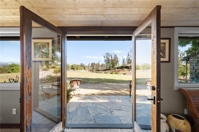 doorway to outside with a healthy amount of sunlight