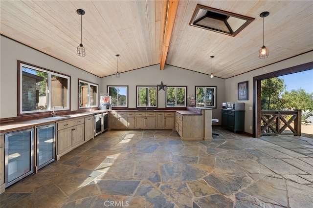 kitchen featuring wine cooler, a wealth of natural light, light brown cabinetry, and wood ceiling