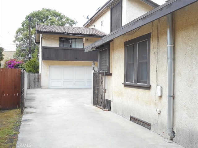 exterior space with a garage