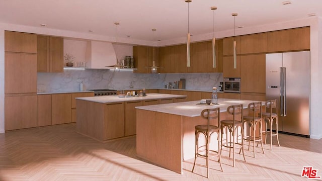 kitchen with pendant lighting, light parquet floors, decorative backsplash, appliances with stainless steel finishes, and a kitchen island