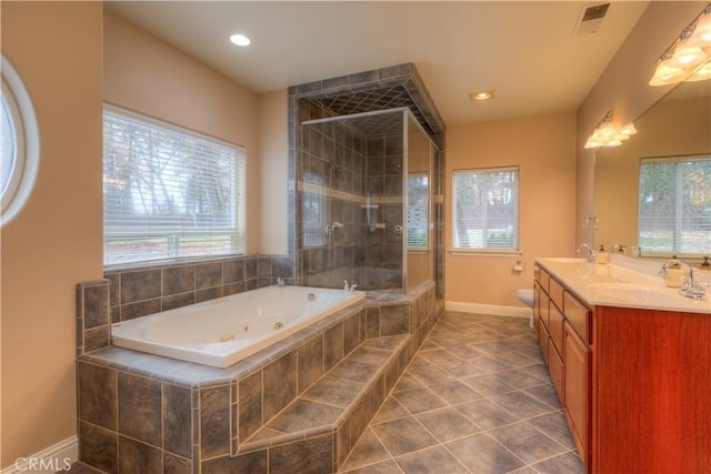 full bathroom with separate shower and tub, toilet, tile patterned flooring, and vanity