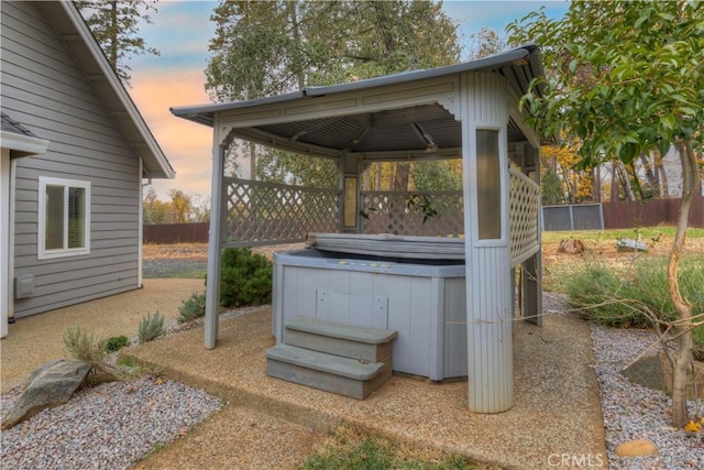 patio terrace at dusk with a gazebo