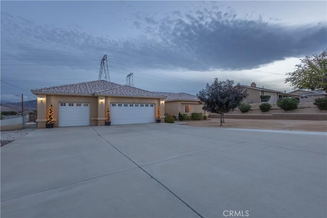 view of side of home with a garage