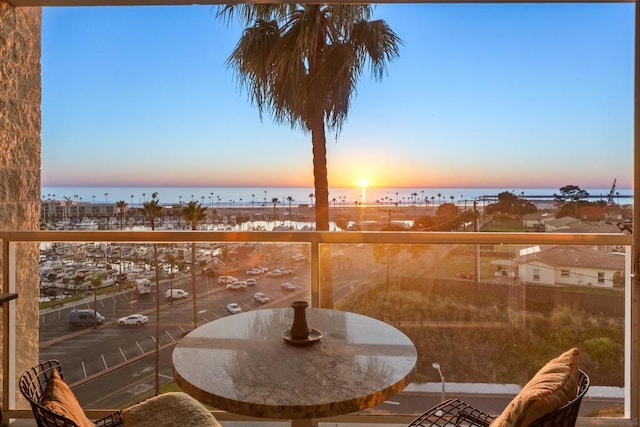 balcony at dusk with a water view