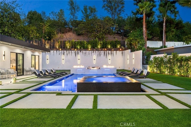 view of swimming pool with a patio