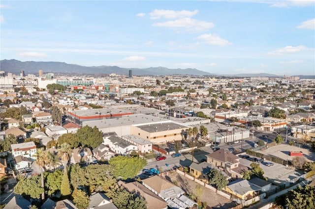 bird's eye view with a mountain view and a city view