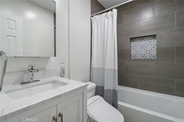 full bathroom featuring vanity, toilet, and shower / bath combo