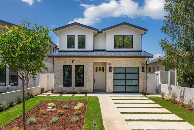 view of front of property with a garage