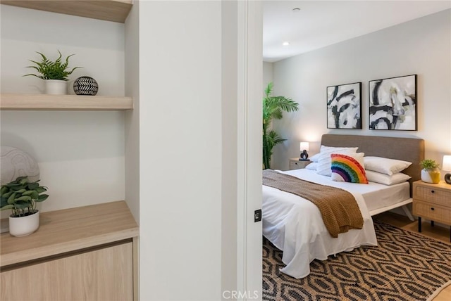 bedroom featuring hardwood / wood-style flooring