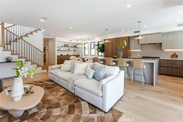 living room featuring light wood-type flooring