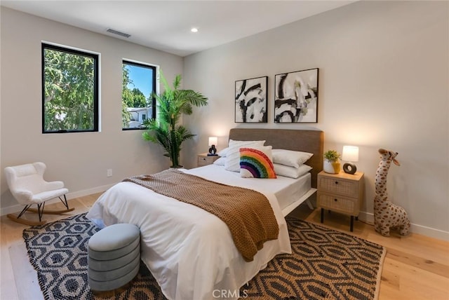 bedroom featuring light hardwood / wood-style flooring