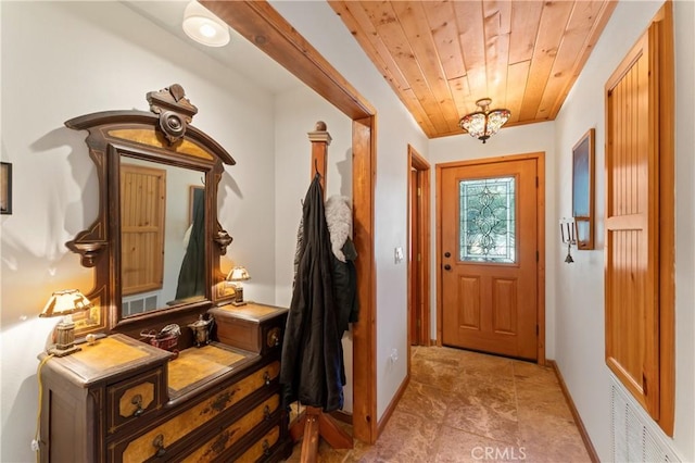 doorway featuring wooden ceiling