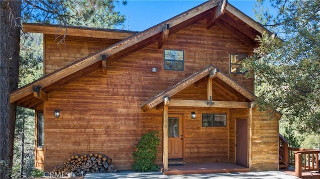 view of log-style house