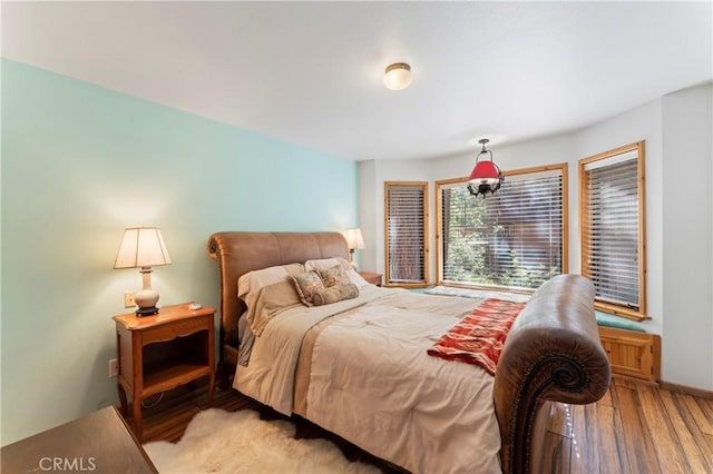 bedroom featuring hardwood / wood-style flooring