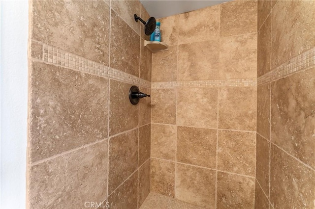 details featuring a tile shower